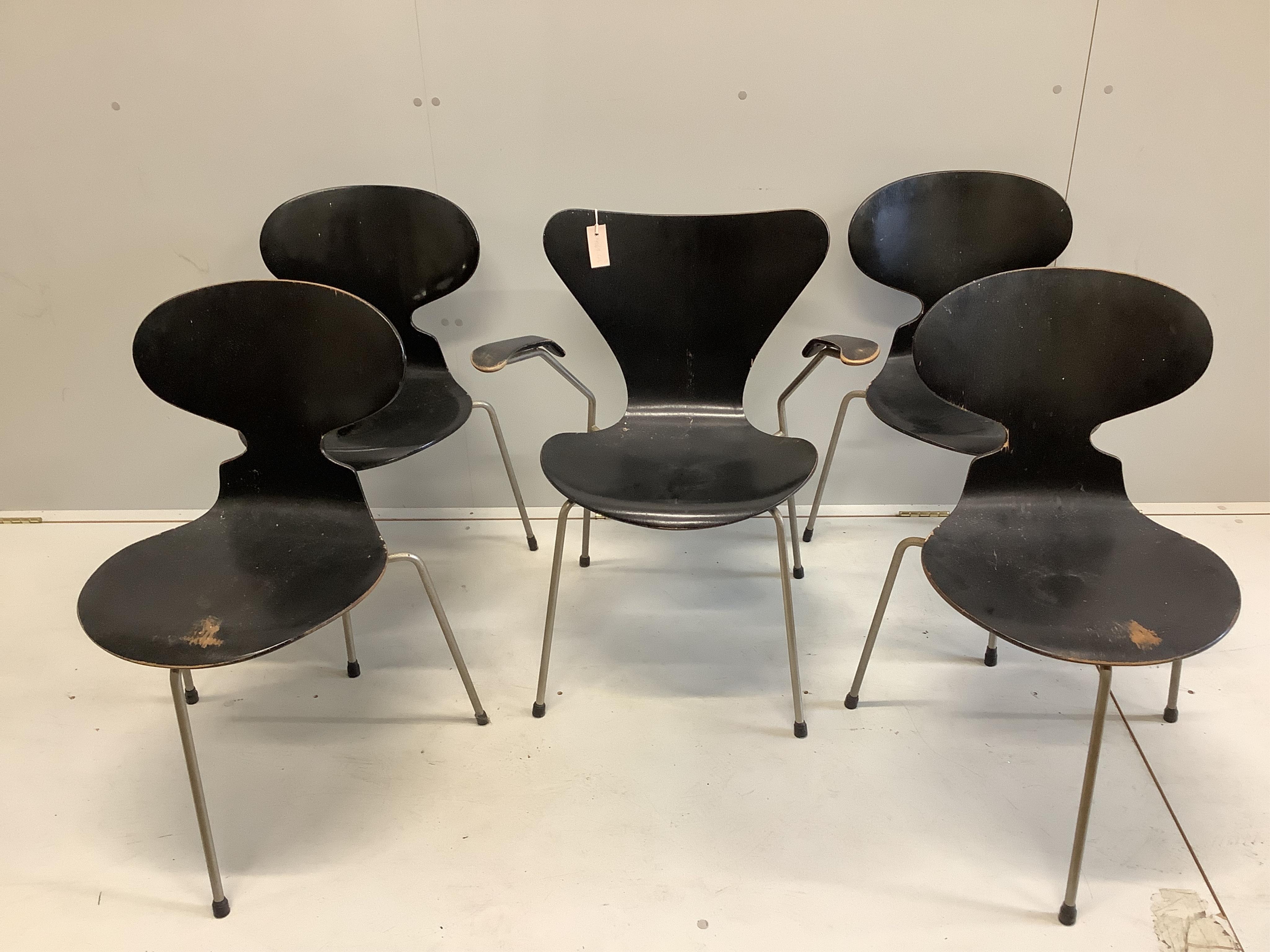 A set of four Danish stacking chairs and one elbow chair, width 63cm, depth 40cm, height 75cm